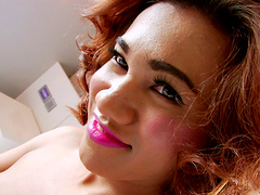 Black pantyhose hug her hard tranny cock as she strokes