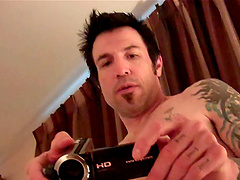 Horny dude films his wife while she gives him an amazing titjob