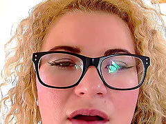 Nerd with long curly hair gets out her toy and masturbates