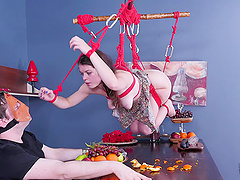 Barely-legal babe gets a nice bondage treatment from the masked guy