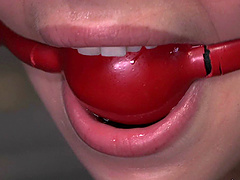 Small-titted Alyssa Branch is ball-gagged, tied up and whipped