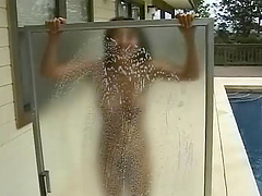 Nice ass solo model stripteasing while getting soapy in shower