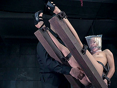 Slave girl Goldie Rush tied up to a machine and pussy poked