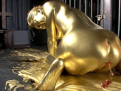 Painting her with the gold color and poking her expensive pussy