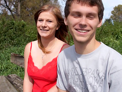 Redhead maiden with nice ass awarding her guy with titjob