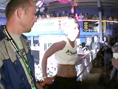 Slutty models drop their clothes to tease people in the crowd