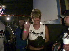 Slutty models drop their clothes to tease people in the crowd