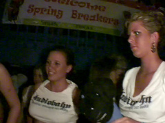 Slutty models drop their clothes to tease people in the crowd