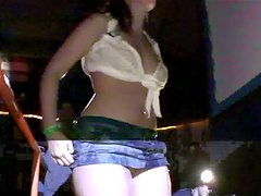 Slutty models drop their clothes to tease people in the crowd