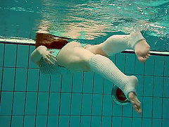 Natural tits model Dashka with glasses playing in the pool