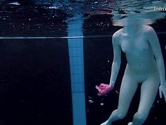 Sexy lesbian teen with her babe performing there teases underwater