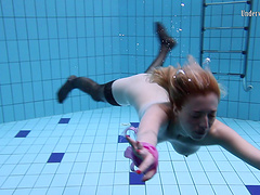 Sexy lesbian teen with her babe performing there teases underwater