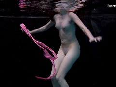 Sexy lesbian teen with her babe performing there teases underwater