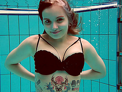 Beautiful teen in bra getting refined with cool pool water