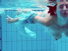 Piyavka Chehova jumps in the pool and gets naked underwater