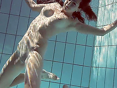 Amateur Russian babe Sima Lastova loves to be filmed nude in the pool