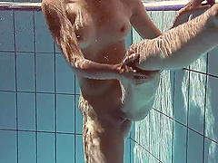 Amateur Russian babe Sima Lastova loves to be filmed nude in the pool