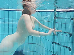 Nude swiming in the pool with amateur Russian redhead Lenka