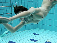 Skinny Russian teen Gazel Podvodkova loves nude swimming in a pool