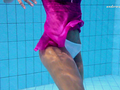 Seductive shoot showcasing solo babe pussy underwater