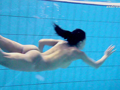 Seductive shoot showcasing solo babe pussy underwater