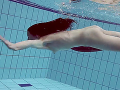 Home video of Russian teen Liza Rachinska swims in the pool naked