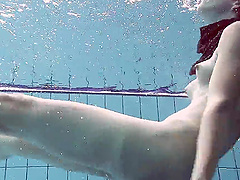 Home video of Russian teen Liza Rachinska swims in the pool naked