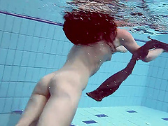 Home video of Russian teen Liza Rachinska swims in the pool naked