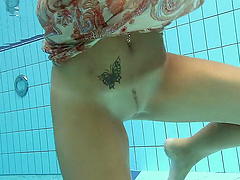 Krasula Fedorchuk loves to tease while getting naked in the pool