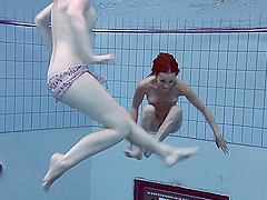 Russian teens get naked in the pool and pleasure their pussies