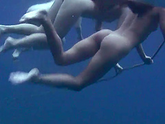 Wild girls swimming naked in the ocean while a friend films them