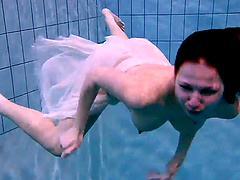 Solo babe Andrea loves to go skinny dipping in the family pool