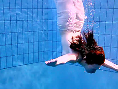 Solo babe Andrea loves to go skinny dipping in the family pool