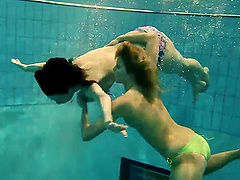 Andrea and Monica love getting naked and swimming in the pool