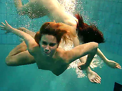 Andrea and Monica love getting naked and swimming in the pool