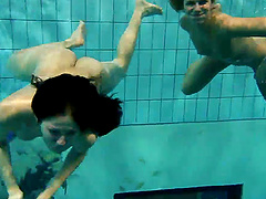 Andrea and Monica love getting naked and swimming in the pool