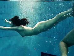 Andrea and Monica love getting naked and swimming in the pool