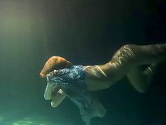 Small tits teen shading attire seductively under water