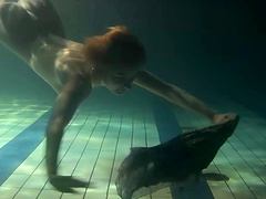 Small tits teen shading attire seductively under water