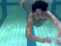 Nude swimming in the pool by attractive redhead babe Katka