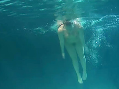 Lenochka Chernova goes swimming naked and plays underwater