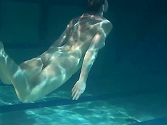 Lenochka Chernova goes swimming naked and plays underwater