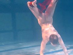 Amateur skinny girl Bulava Lozhkova takes a nude swimm in the pool