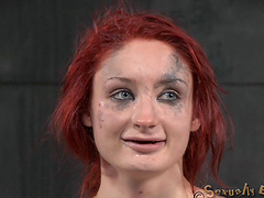 Redhead amateur Violet Monroe sucks a large black dick during torture