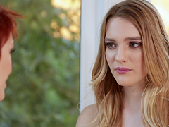 Pretty little blonde gets into a 69 position with her redhead friend