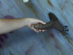 Dirty white male loves to suck a fat black dick thru Gloryhole