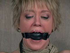 Blonde pornstar Dee Williams enjoys getting her tits tortured