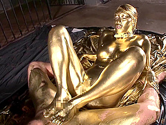 Hot chick covered in golden paint wants to play with a dick