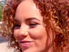 Eli Luxx is a honey with curly hair in need of a cock