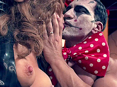 Scary clown has his cock sucked and ridden by Brooklyn Lee